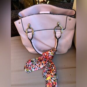 London Fog pink purse with multiple compartments.